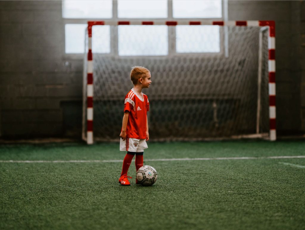 7 Ways To Keep Your World Growing Without Burning  The Midnight Oil a boy playing football